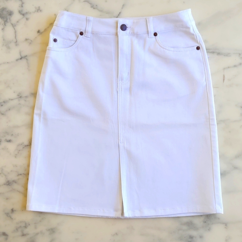 NWOT. The Limited Stretch White Denim Skirt with Front Opening.